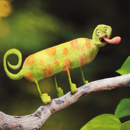 Toy chameleon on a branch with a blurred green background